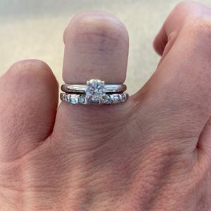 0.75 solitaire round cut Diamond with a .24 weight baguette style wedding band